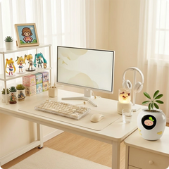 PlantBot smart planter on a clean white minimalist desk, showing its use as a modern office companion and home decor.